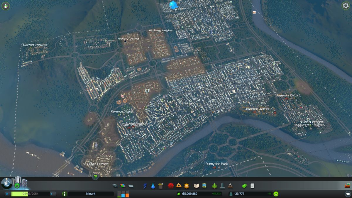 Cities: Skylines (Windows) screenshot: City overview. The polluted areas are clearly visible.