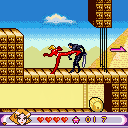 Totally Spies!: The Mobile Game (J2ME) screenshot: Clover attacks with a powerful kick. (medium screen)