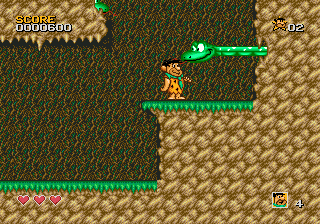 The Flintstones (Genesis) screenshot: You should hit those green snakes on the head: the will be shocked and you'll be able to jump over them unharmed