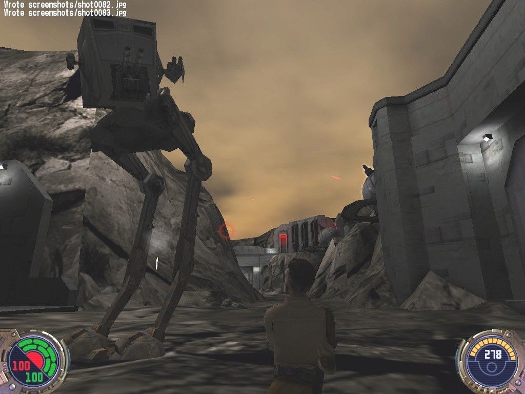 Star Wars: Jedi Knight II - Jedi Outcast (Collector's Edition) (Windows) screenshot: Kyle says 'hi' to an AT-ST. Even with the Force, these things are incredibly tough to take down. Without the Force, Kyle is going to need a MUCH bigger gun