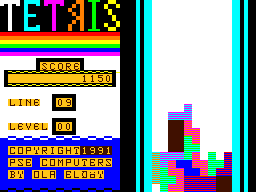 Tetris (Dragon 32/64) screenshot: A sampled voice says "Tetris!" when you land the leftmost block