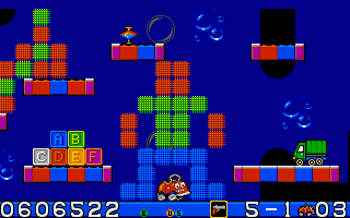 CarVup (Amiga) screenshot: Toy world - now you're armed with simple one-bullet pistol
