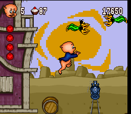 Porky Pig's Haunted Holiday (SNES) screenshot: Remember to look both ways before cross the tracks!