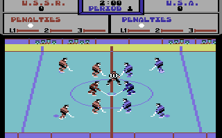 Powerplay Hockey (Commodore 64) screenshot: The referee is ready to drop the puck.
