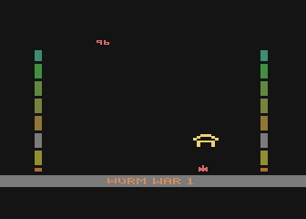 Worm War I (Atari 8-bit) screenshot: Game started. I want to grab the fuel tank.