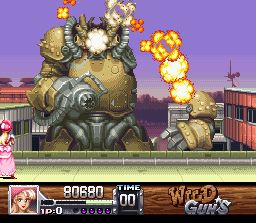 Wild Guns (SNES) screenshot: The bigger they are, the harder they explode. The Carson City boss bites the dust