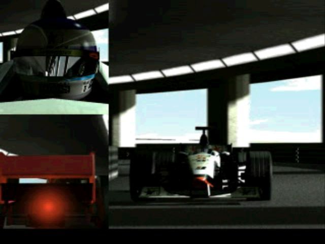 Formula 1 98 (PlayStation) screenshot: A split screen action shot from the game's introduction sequence.<br>This does not happen in-game