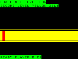 Ninja Warrior (TRS-80 CoCo) screenshot: A sample screen between levels - what belt you are working on