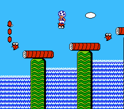 Super Mario Bros. 2 (NES) screenshot: Toad rides a fish over a waterfall.