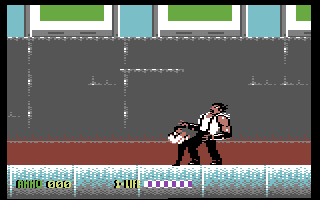 Sly Spy: Secret Agent (Commodore 64) screenshot: Kicking a boss