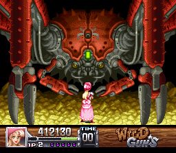 Wild Guns (SNES) screenshot: Annie faces the Gold Mine boss. It's a robotic crab!