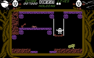 Dizzy: The Ultimate Cartoon Adventure (Commodore 64) screenshot: Important items are often guarded by enemies