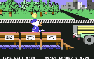 Donald Duck's Playground (Commodore 64) screenshot: Working at the produce loading dock. I need to catch the fruit and put it in the correct crate.