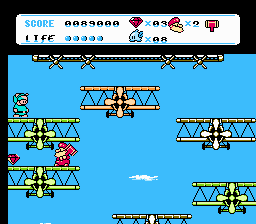 Don Doko Don 2 (NES) screenshot: A lot of biplanes here