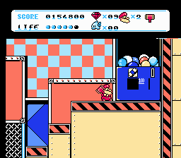 Don Doko Don 2 (NES) screenshot: Careful, that gumball machine is not what it seems