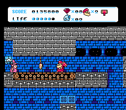 Don Doko Don 2 (NES) screenshot: On a conveyor belt