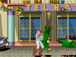 Knuckle Bash (Arcade) screenshot: Beating up busboys
