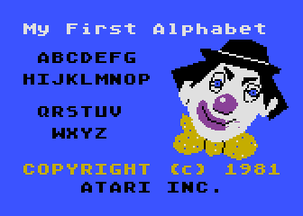 My First Alphabet (Atari 8-bit) screenshot: The clown smiles when the song is done.