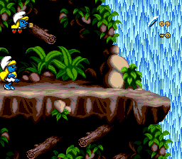 The Smurfs Travel the World (Genesis) screenshot: That log might hurt Smurfette, but will also uncover a shard.
