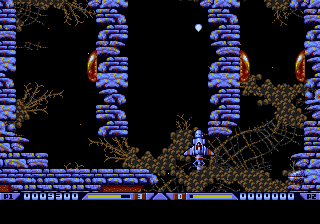 Xenon 2: Megablast (Genesis) screenshot: Those slugs on the walls must be taken care of before entering those tunnels.