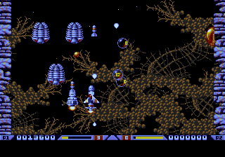 Xenon 2: Megablast (Genesis) screenshot: Now with a missile power, doubling the firepower of the ship.