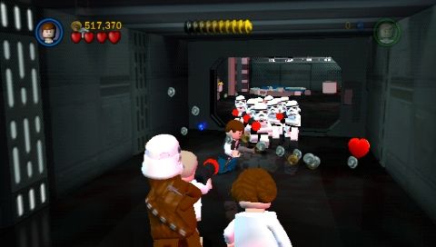 LEGO Star Wars II: The Original Trilogy (PSP) screenshot: Han Solo vs. Stormtroopers at Death Star corridors