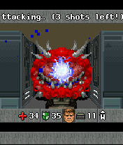 Doom RPG (J2ME) screenshot: Fighting a Cacodemon with the plasma gun.