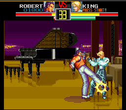 Art of Fighting (SNES) screenshot: Here, Robert is teaching King how to do a waltz... or not.