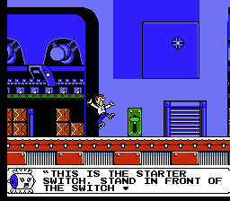The Jetsons: Cogswell's Caper (NES) screenshot: Rosie is tutoring George on the use of a basic switch.