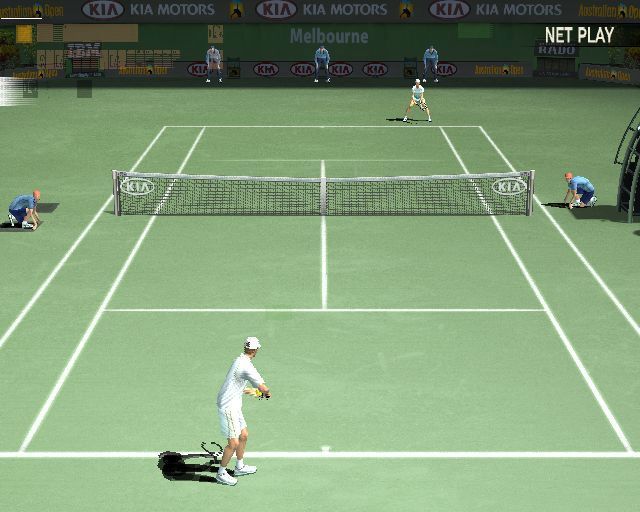 Smash Court Tennis: Pro Tournament 2 (PlayStation 2) screenshot: A singles match in Spectator mode<br>L1 changes the camera angle and CIRCLE/SQUARE change the AI player's strategy