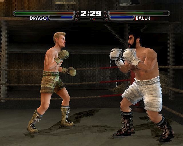 Rocky: Legends (PlayStation 2) screenshot: Career Mode and Drago's first fight in a remote barracks <br>The nearside ropes always disappear to give the player a good view of the action