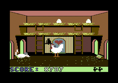 Chicken Chase (Commodore 64) screenshot: There is a rat in the henhouse