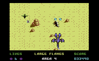 Dragon Spirit (Commodore 64) screenshot: Trying to kill the creature on the ground to release a power-up.
