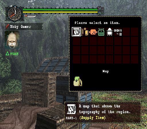 Monster Hunter (PlayStation 2) screenshot: The game helpfully gives us a chest with useful items. The player uses the D-Pad to select the items from the grid and transfer them to the inventory<br>Trial version