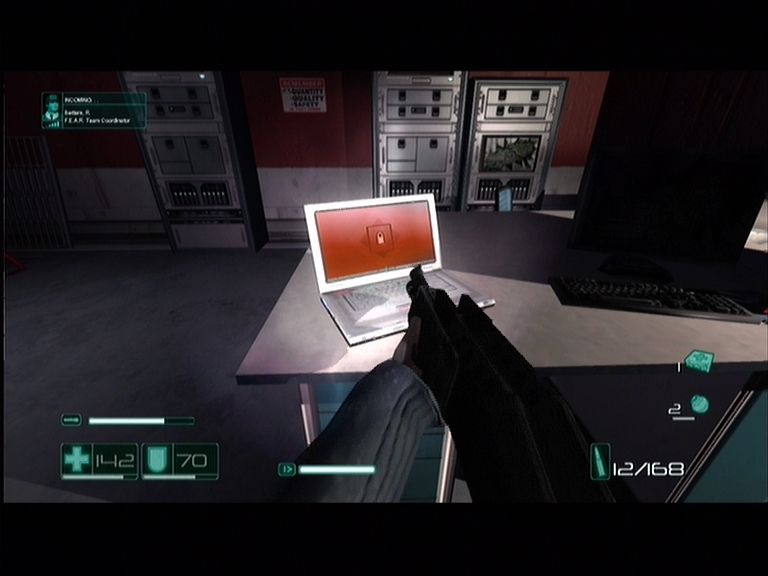 F.E.A.R.: First Encounter Assault Recon (Xbox 360) screenshot: Laptops contain valuable information on the situation you are in.