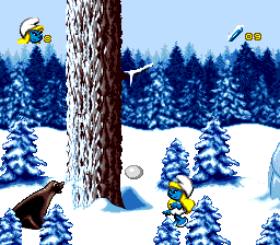 The Smurfs Travel the World (Genesis) screenshot: These snowballs are the first smurf where kicking comes really handy.