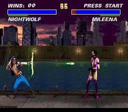 Ultimate Mortal Kombat 3 (SNES) screenshot: Nightwolf launches an arrow at Mileena
