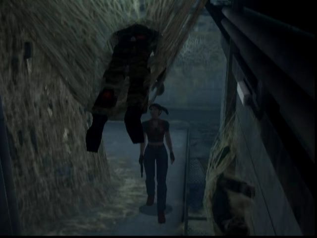 Resident Evil: Code: Veronica (Dreamcast) screenshot: Giant insects took over part of the Antarctic base; Claire checks out their handiwork