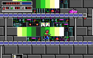 Bio Menace (DOS) screenshot: You must take a Radiation pill to get near these green glowing machines.