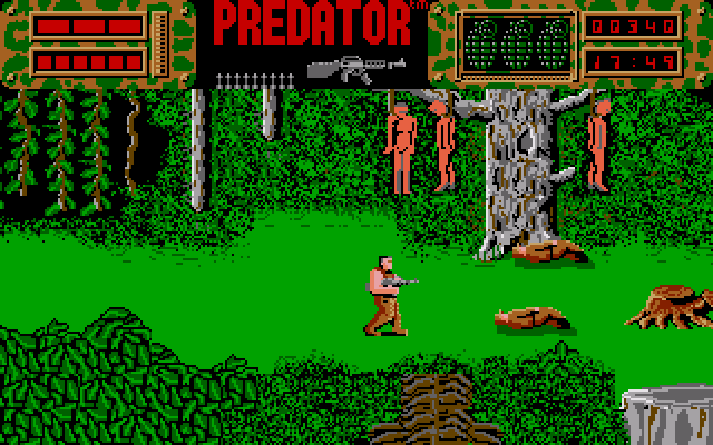 Predator (Amiga) screenshot: Three people have been hung to a tree
