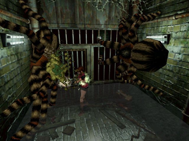 Resident Evil 2 (Windows) screenshot: Claire fighting giant tarantulas in the sewer