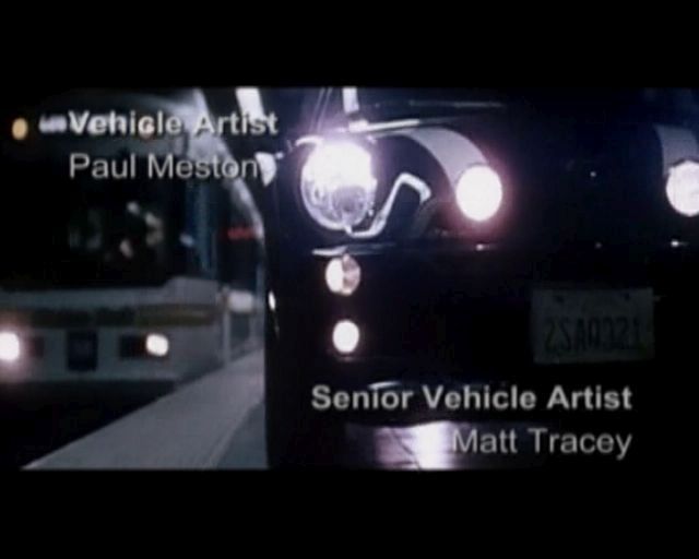 The Italian Job (PlayStation 2) screenshot: After the company logos there's an introduction sequence that mixes live and animated action whine music plays and credits roll
