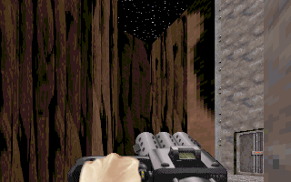 Duke Nukem 3D (DOS) screenshot: Later, Episode One will take you to beautiful outdoor areas. Ahh, the starry skies - you'll soon travel there!..