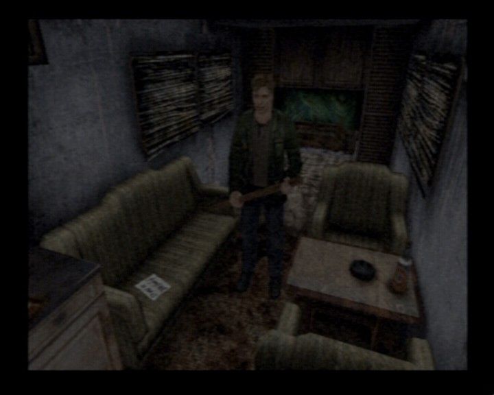 Silent Hill 2 (PlayStation 2) screenshot: Checking inside the car trailer