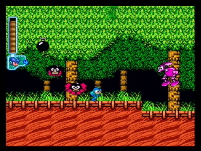 Mega Man: Anniversary Collection (PlayStation 2) screenshot: Mega Man is chased by Bubble Bats
