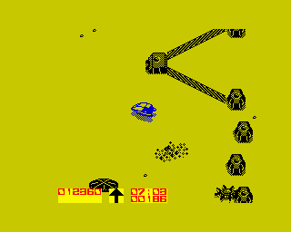 Power (ZX Spectrum) screenshot: Blister pursuit. The little blue fella over there has to hit the turret so that the wall defences momentarily get down.