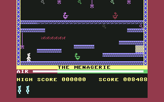 Manic Miner (Commodore 64) screenshot: The menagerie. I'm not sure what the birds are.