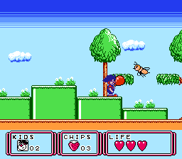 Kid Klown in Night Mayor World (NES) screenshot: Throwing a balloon at a giant mosquito