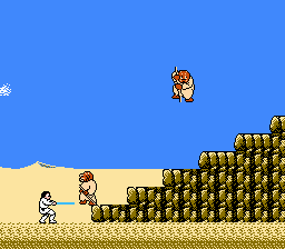 Star Wars (NES) screenshot: Sandpeople don't stand a chance against Luke's lightsaber.