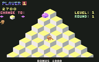 Q*bert (Commodore 64) screenshot: Round 1 completed.